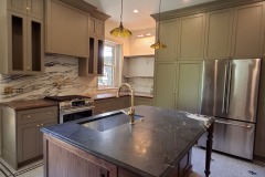 Custom-made-kitchen-cabinets-sage-green-walnut-island-countertop