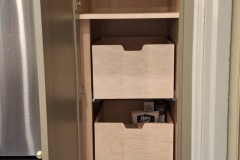 Green-kitchen-pantry-cabinet